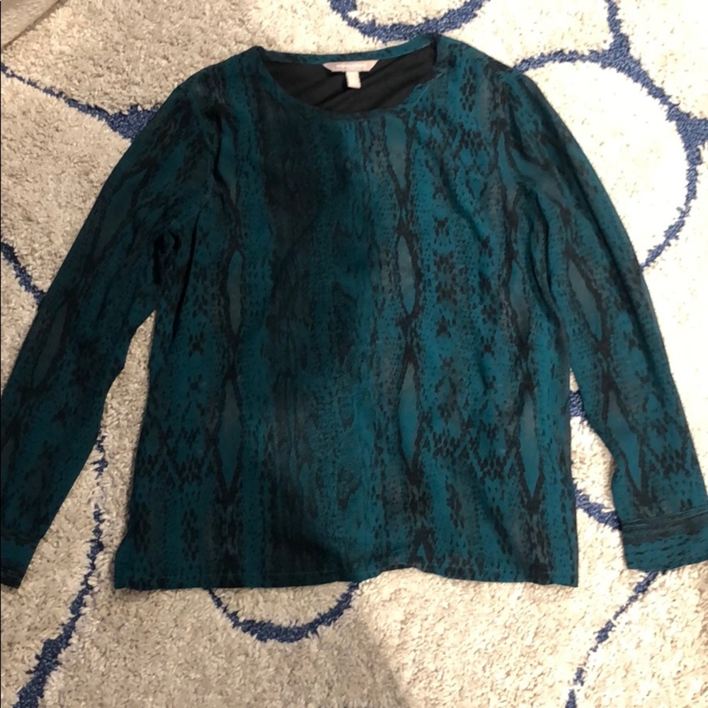 Green blouse with a snake skin pattern